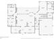 Detailed floor plan showcasing the layout of the first floor including kitchen, living room, and bedrooms at 102 Rosebury Dr, Canton, GA 30115