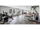 Finished gym with wood floors, windows with views, and plenty of space for gym equipment at 102 Rosebury Dr, Canton, GA 30115