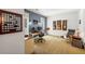 A home office offers lots of space, lots of natural light, and decorative elements at 102 Rosebury Dr, Canton, GA 30115
