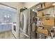 Walk-in pantry with stainless steel refrigerator and wire shelving at 102 Rosebury Dr, Canton, GA 30115
