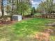 A shed in the backyard providing extra storage at 102 Rosebury Dr, Canton, GA 30115