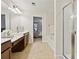 Bright bathroom with double vanity, glass door shower, and soaking tub at 220 Ashley Se Ln # 19, Smyrna, GA 30080
