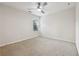 Bedroom with a ceiling fan, carpet, and white walls at 220 Ashley Se Ln # 19, Smyrna, GA 30080
