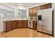 Well-equipped kitchen with stainless steel appliances, granite countertops, and hardwood floors at 220 Ashley Se Ln # 19, Smyrna, GA 30080