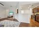 Spacious living room with hardwood floors that flows into the modern kitchen with stainless steel appliances at 220 Ashley Se Ln # 19, Smyrna, GA 30080