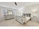 Bright main bedroom featuring a ceiling fan, large dresser, and plush carpet at 220 Ashley Se Ln # 19, Smyrna, GA 30080