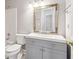 Bathroom with gray vanity and white fixtures at 2650 Westbury Ct, Suwanee, GA 30024