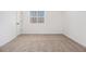 This bedroom has neutral carpet, baseboards, and a window for natural light at 594 Waynes Se Ct, Atlanta, GA 30354