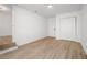 Bright bedroom features hardwood floors and a closet with ample storage space at 594 Waynes Se Ct, Atlanta, GA 30354