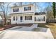 Charming home with a covered front porch and inviting curb appeal at 594 Waynes Se Ct, Atlanta, GA 30354