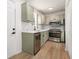 Modern kitchen features stainless steel appliances and sleek countertops at 594 Waynes Se Ct, Atlanta, GA 30354
