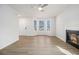 Bright living room featuring a fireplace and large bay windows at 594 Waynes Se Ct, Atlanta, GA 30354