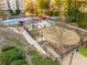 Overhead view of dog park, community BBQ area, and pool in multi-Gathering community at 799 Hammond Dr # 305, Atlanta, GA 30328