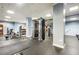 Bright gym with multiple exercise machines, free weights, and ample workout space at 799 Hammond Dr # 305, Atlanta, GA 30328