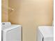 Bright laundry room with modern appliances at 799 Hammond Dr # 305, Atlanta, GA 30328