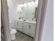 Stylish bathroom with double sinks, ample counter space, and modern fixtures at 1931 Amber Dawn Way, Lawrenceville, GA 30043
