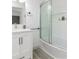 Modern bathroom featuring a glass shower door, sleek fixtures, and ample counter space at 1931 Amber Dawn Way, Lawrenceville, GA 30043