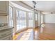 Bright dining area with a large bay window overlooking a wooden deck at 1931 Amber Dawn Way, Lawrenceville, GA 30043