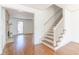 Home entryway with stairs and doorway into spacious living room at 1931 Amber Dawn Way, Lawrenceville, GA 30043