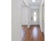 Inviting foyer with hardwood floors, a decorative front door, and ample natural light at 1931 Amber Dawn Way, Lawrenceville, GA 30043