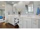 Elegant bathroom with double vanity, granite countertops, and ample storage at 4465 Newhall Dr, Cumming, GA 30040