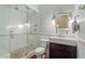 Stylish bathroom with glass shower, tiled walls, and modern vanity at 4465 Newhall Dr, Cumming, GA 30040