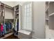 Well-organized walk-in closet featuring custom shelving and storage solutions at 4465 Newhall Dr, Cumming, GA 30040