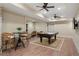 Basement game room featuring hardwood floors, recessed lighting, a billiards table and a sitting area at 4465 Newhall Dr, Cumming, GA 30040