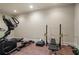 Home gym featuring exercise equipment and weight training station at 4465 Newhall Dr, Cumming, GA 30040