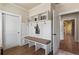 Mudroom with cubbies, hooks, and bench seating offers storage and style at 4465 Newhall Dr, Cumming, GA 30040