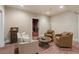 Sitting room with recessed lighting, wood floors, and comfortable seating at 4465 Newhall Dr, Cumming, GA 30040