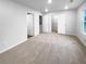 Spacious bedroom featuring soft carpet, walk-in closet, and a bright window at 1112 Highwood Ln, Atlanta, GA 30344