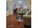 Comfortable living room featuring laminate wood flooring and comfortable sofas at 2335 Boulder Se Rd, Atlanta, GA 30316