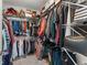 Organized walk-in closet with ample storage for clothing, shoes, and accessories maximizing space and convenience at 355 Walker Avenue, Roswell, GA 30076