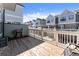 Spacious wooden deck great for outdoor relaxation and gatherings overlooking townhomes at 355 Walker Avenue, Roswell, GA 30076
