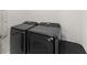 Modern laundry room featuring matching washer and dryer units at 355 Walker Avenue, Roswell, GA 30076