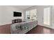 Bright living room with hardwood floors, modern furniture, and natural light at 355 Walker Avenue, Roswell, GA 30076