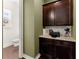 Office nook with custom dark cabinets, granite counters, and a convenient printer station at 355 Walker Avenue, Roswell, GA 30076