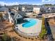 Aerial view of community pool and clubhouse offering residents a luxurious and convenient recreation area at 355 Walker Avenue, Roswell, GA 30076