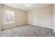 Bedroom with carpeted floor, one window with blinds, and neutral paint at 1309 Avington Glen Dr, Lawrenceville, GA 30045
