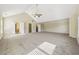 Large bonus room with high vaulted ceiling and carpet at 1309 Avington Glen Dr, Lawrenceville, GA 30045