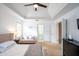 Main bedroom with tray ceiling, accent lighting, and views to the hallway at 2552 Forest Meadow Ln, Lawrenceville, GA 30043