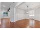 Bright dining room features hardwood floors, wainscoting and views into the adjacent room at 304 Trecastle Ln # 28, Canton, GA 30114