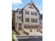 Charming three-story home with attached two-car garage and inviting front entrance at 304 Trecastle Ln # 28, Canton, GA 30114