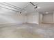 Spacious three car garage with ample room for parking and storage or a workshop area at 304 Trecastle Ln # 28, Canton, GA 30114