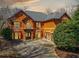 Elegant two-story home with a driveway and a well-maintained yard at 511 Newburgh Way, Roswell, GA 30075