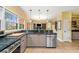 Charming kitchen with stainless steel appliances and a functional layout at 511 Newburgh Way, Roswell, GA 30075