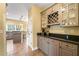 Kitchen featuring stylish cabinets with a view to a living area at 511 Newburgh Way, Roswell, GA 30075
