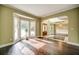 Bright and open living room with hardwood floors and bay windows at 511 Newburgh Way, Roswell, GA 30075