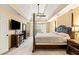 Main bedroom with trey ceiling, carpet, and en-suite bathroom at 511 Newburgh Way, Roswell, GA 30075